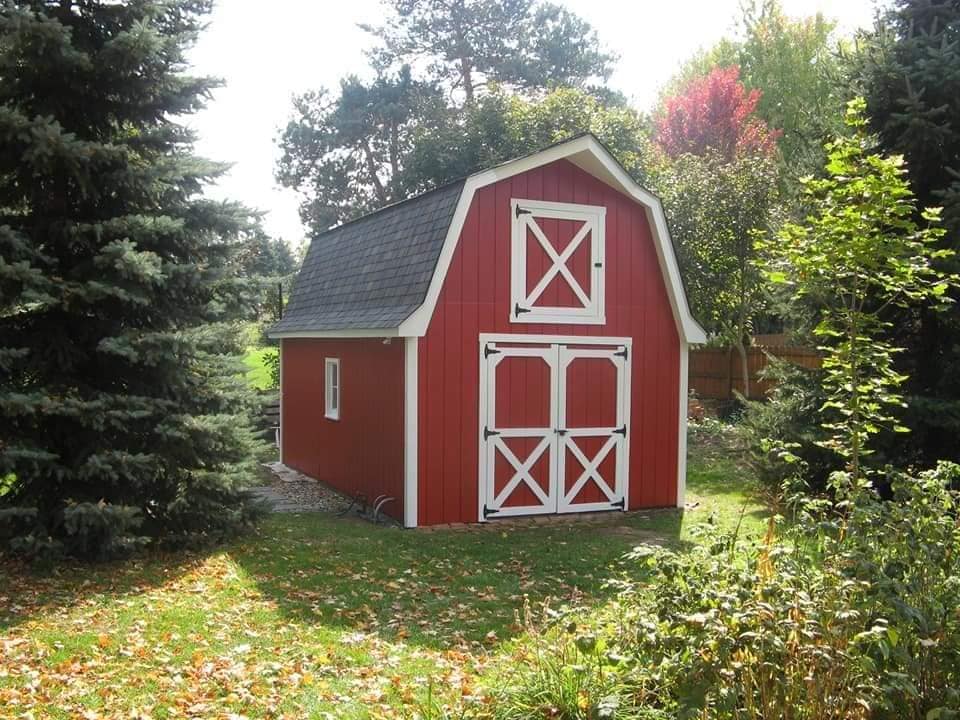 A&M Flat Rock red barn with white painted doors and trim